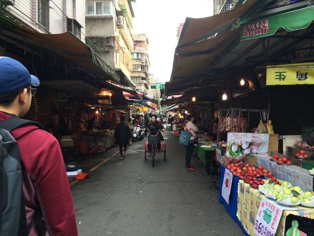 Vendors lined the street. The streets aren't closed to scooters or cars so you have to be careful.