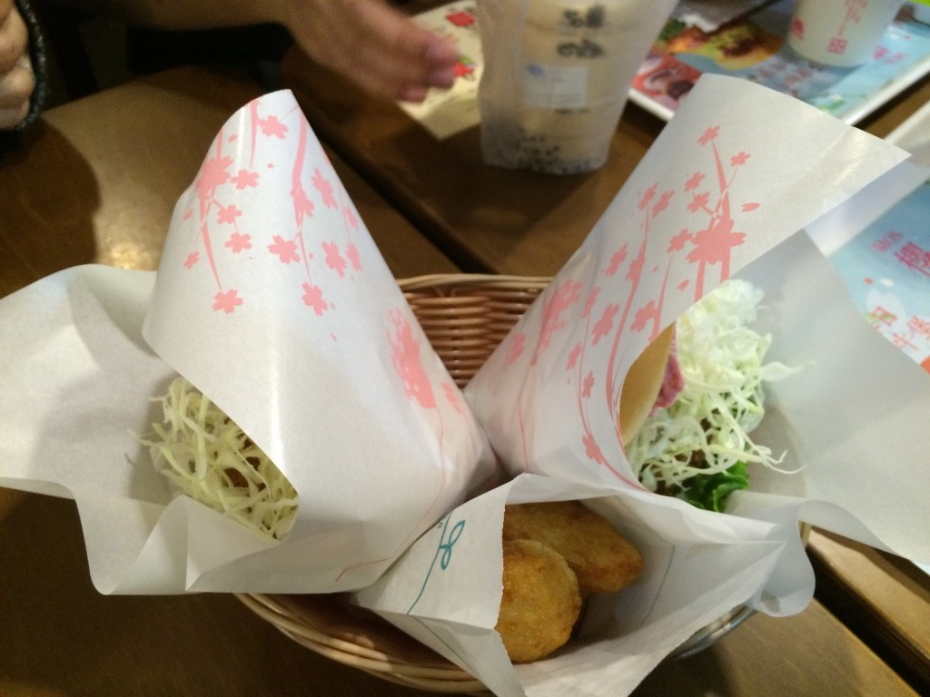 Our two burgers and chicken nuggets (75 NT = $3 CAD for my shrimp burger and 170 NT = $6.90 CAD for Tim's combo)