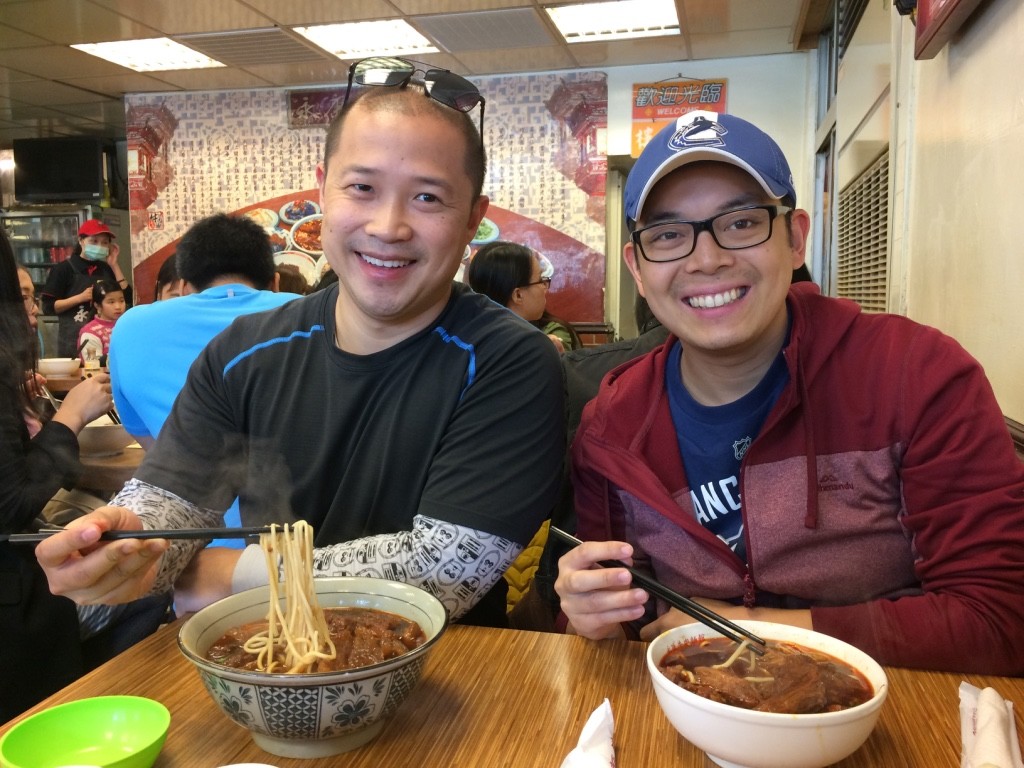 Noel and Tim with their beef noodle - the most tender beef we've had so far