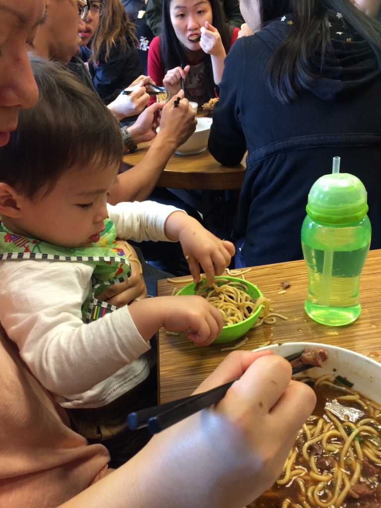 Nate enjoying the noodles and beef