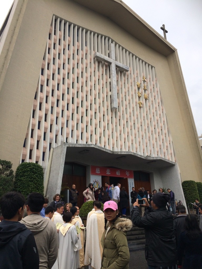 Waiting to go into the church