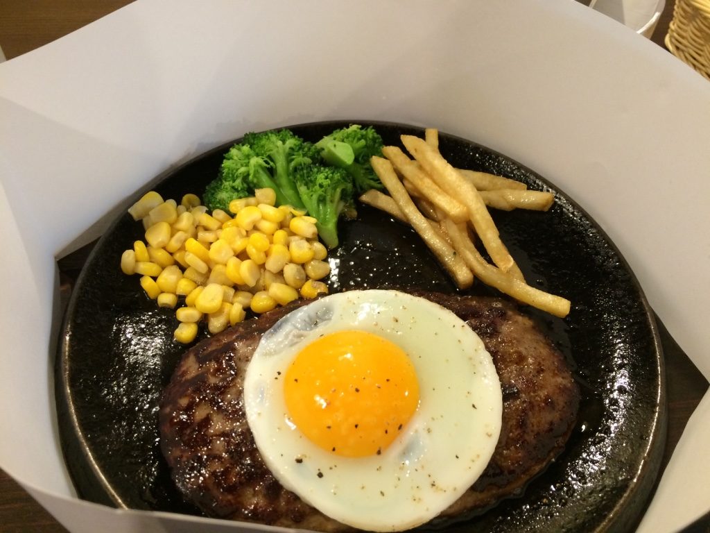 My hamburger steak with an egg. 830 JPY = $9.45 and 100 JPY = $1.13 CAD more for the egg.