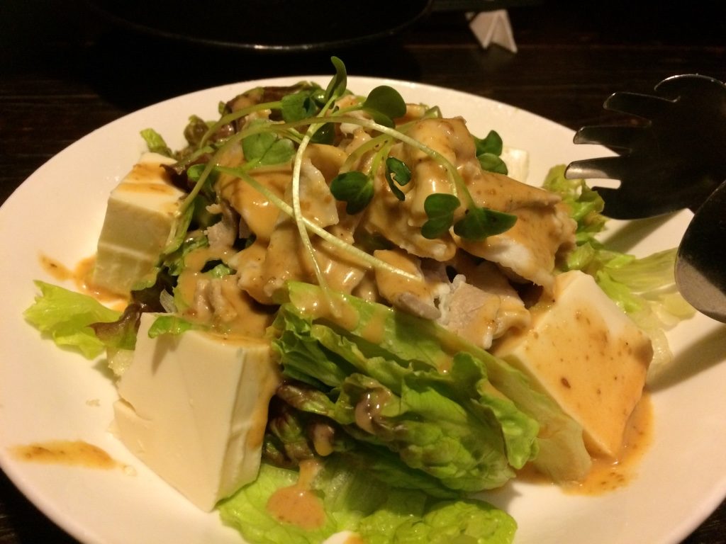 Tofu and pork sliced salad with sesame dressing 399 JPY = $4.50 CAD