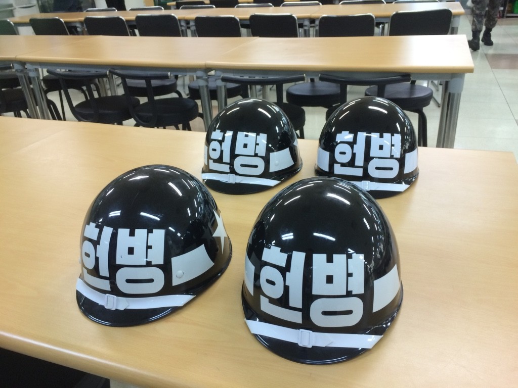 Soldiers helmets. They left them on the table while they ate