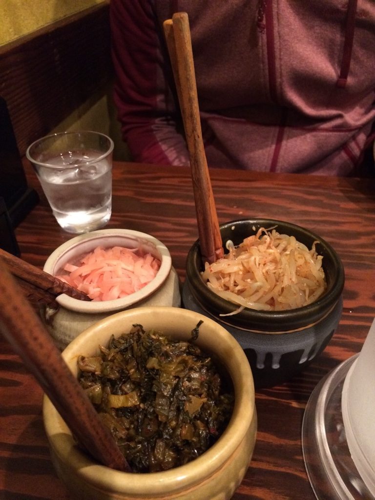 Ginger, bean sprouts and pickled greens