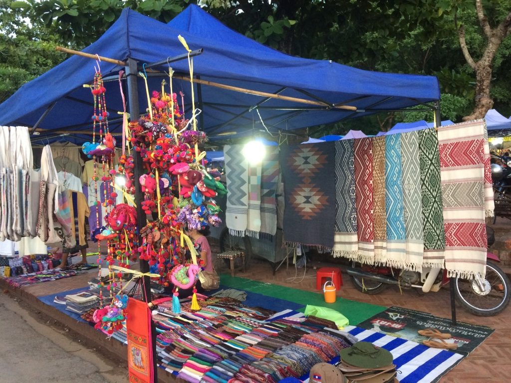 We got the blanket on the far right. I didn't realize I took this picture the night before of exact stall we bought from tonight