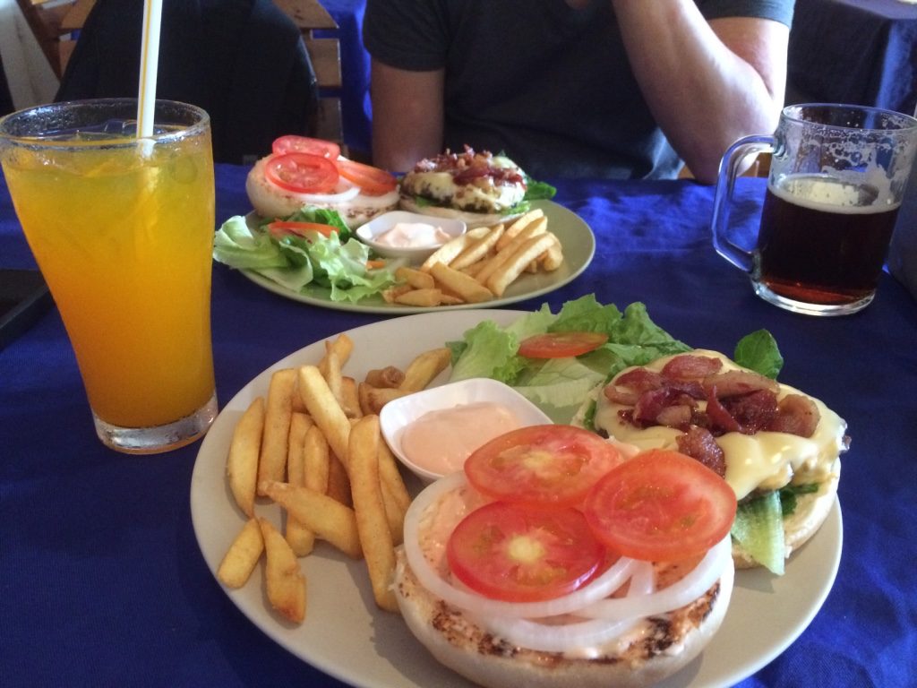 Our burgers and drinks - a pretty expensive meal here (112,000 LAK = $18 CAD)