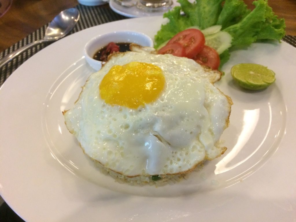 Tim's fried rice covered with a sunny side up egg