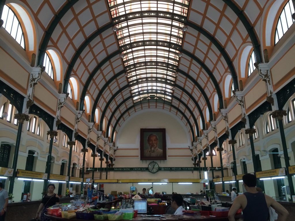 Inside the Saigon Central Post Office. Portraits of Ho Chi Minh are everywhere. Similar to how pictures of the King are everywhere in Thailand