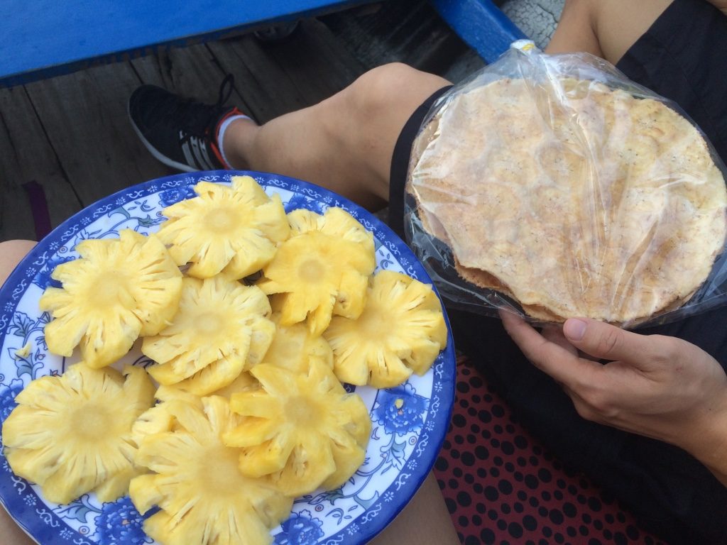 My (the boat driver) cut us up pineapple that she bought from Cai Rang and we tried the yummy banana paper chips