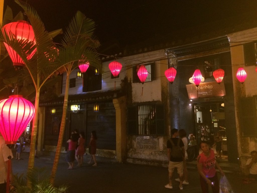 Our view from our table at Morning Glory. The woman in red was trying to sell these balls that light up to children and a guy sitting on the ground kept saying "hello, would you like to buy hand made fans" every 5 minutes