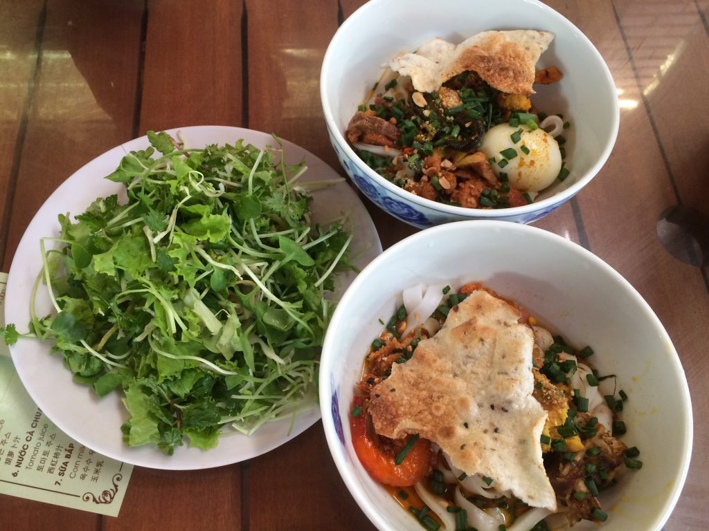 Our bowls of noodles. Tim's bac biet (top) was 45,000 VND = $2.60 CAD and mine was 30,000 VND = $1.75 CAD