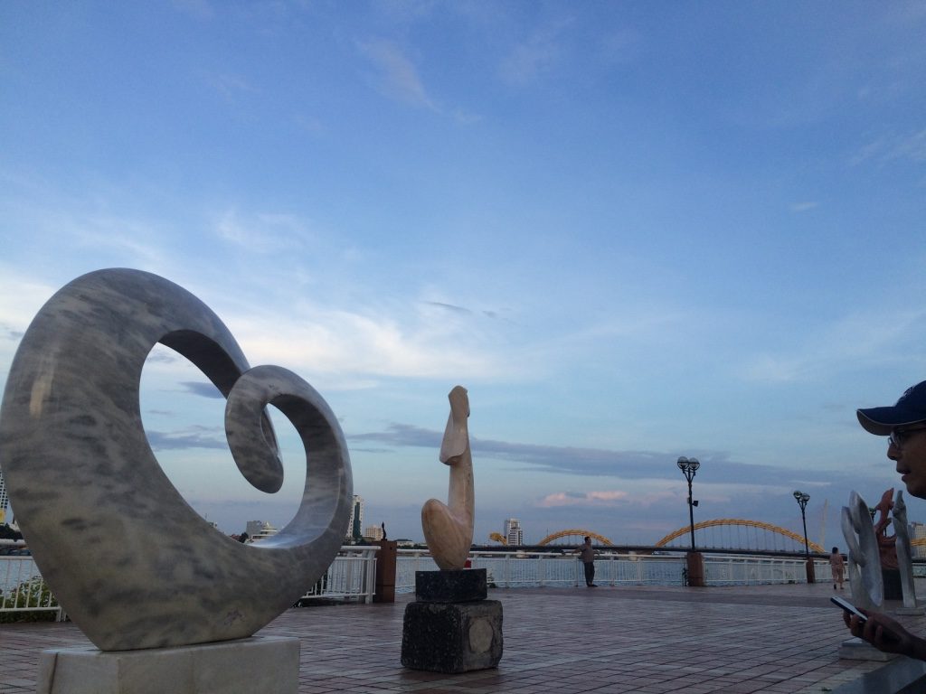 Marble statue art lines the Han River walk way