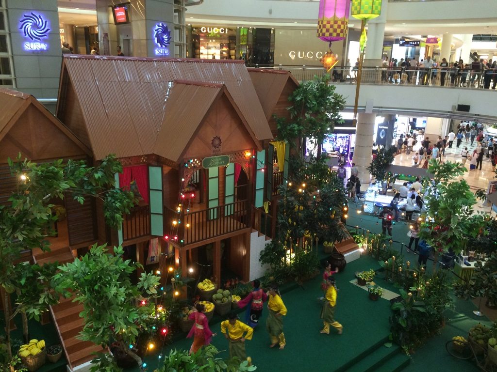 Singing and dancing inside Suria Mall